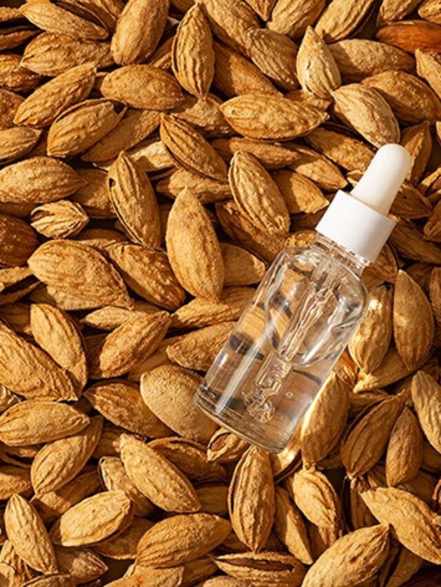 cropped-essential-almond-oil-bottles-nuts-almonds-with-she-2021-09-03-16-19-14-utc-1.jpg