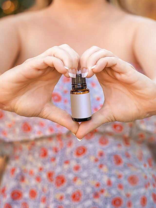 cropped-woman-hold-in-hands-the-bottle-of-essential-oil-2021-08-29-08-35-04-utc.jpg