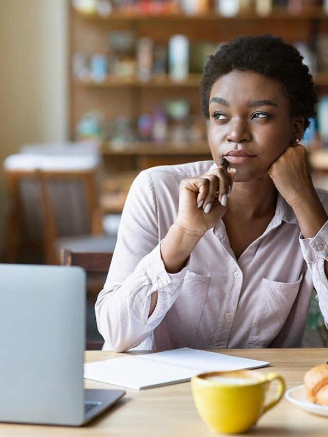 cropped-young-black-woman-with-notebook-sitting-near-lapto-2021-09-02-23-48-48-utc.jpg