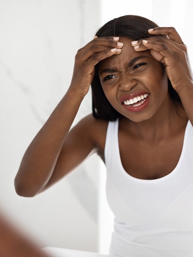 cropped-unhappy-black-woman-with-problem-skin-popping-pimp-2022-02-17-02-40-53-utc.jpg